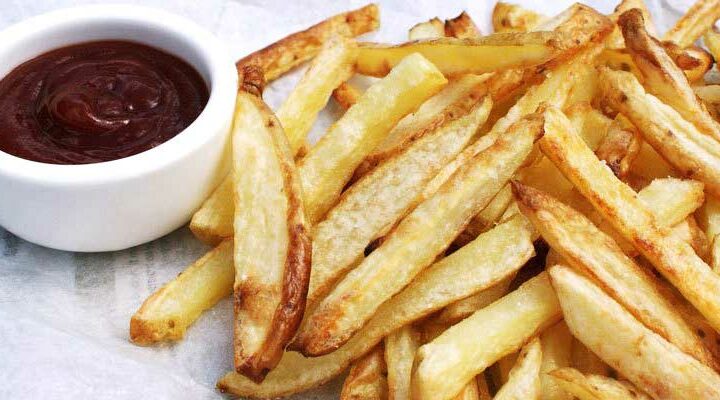 Crispy Oven Baked Fries. The potatoes are oven cooked in coconut oil, making them a healthy side dish.