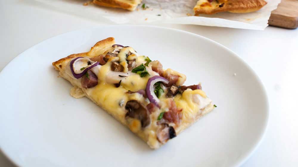 Christmas Leftovers Pizza - White Turkey and Ham. A delicious and different pizza that uses Turkey, Ham, Mushrooms, Red Onions and leftover Cheese.