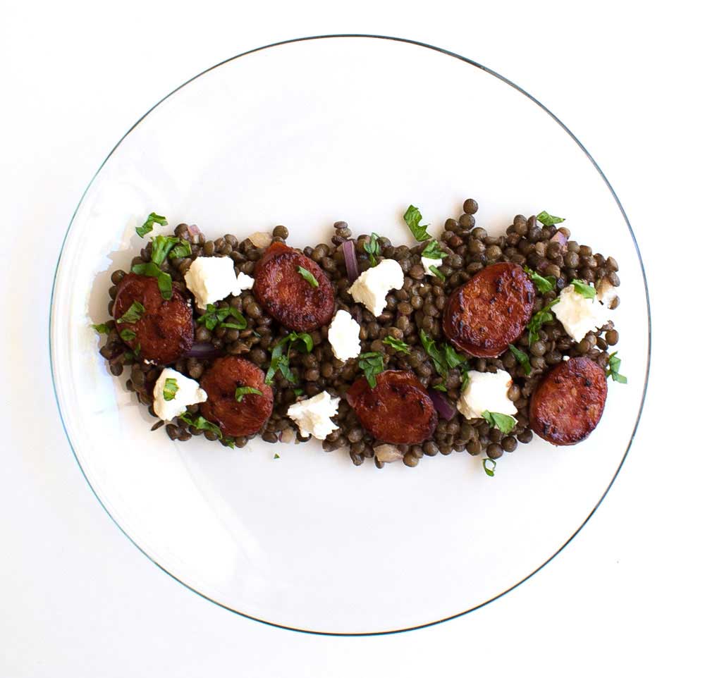Chorizo, Feta and Lentil Salad. Creamy puy lentils in a light dressing served with salty soft feta and crispy hot chorizo. A great gluten free recipe.