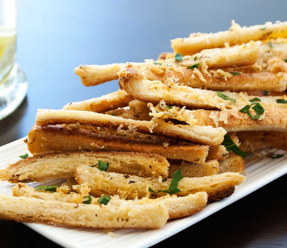 Garlic and Parmesan Crisp Sticks. The perfect crisp nibble with drinks. Crunchy, garlicky and full of flavour. A great snack.