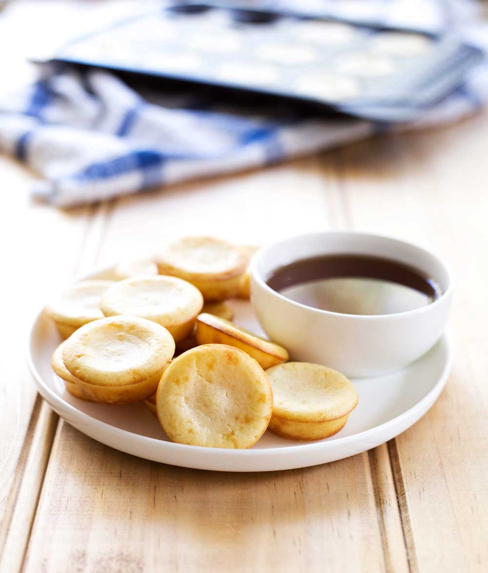 Oven Baked Pancake Bites with Whisky Maple Syrup. They look like cupcakes and taste like pancakes. The perfect treat for breakfast.