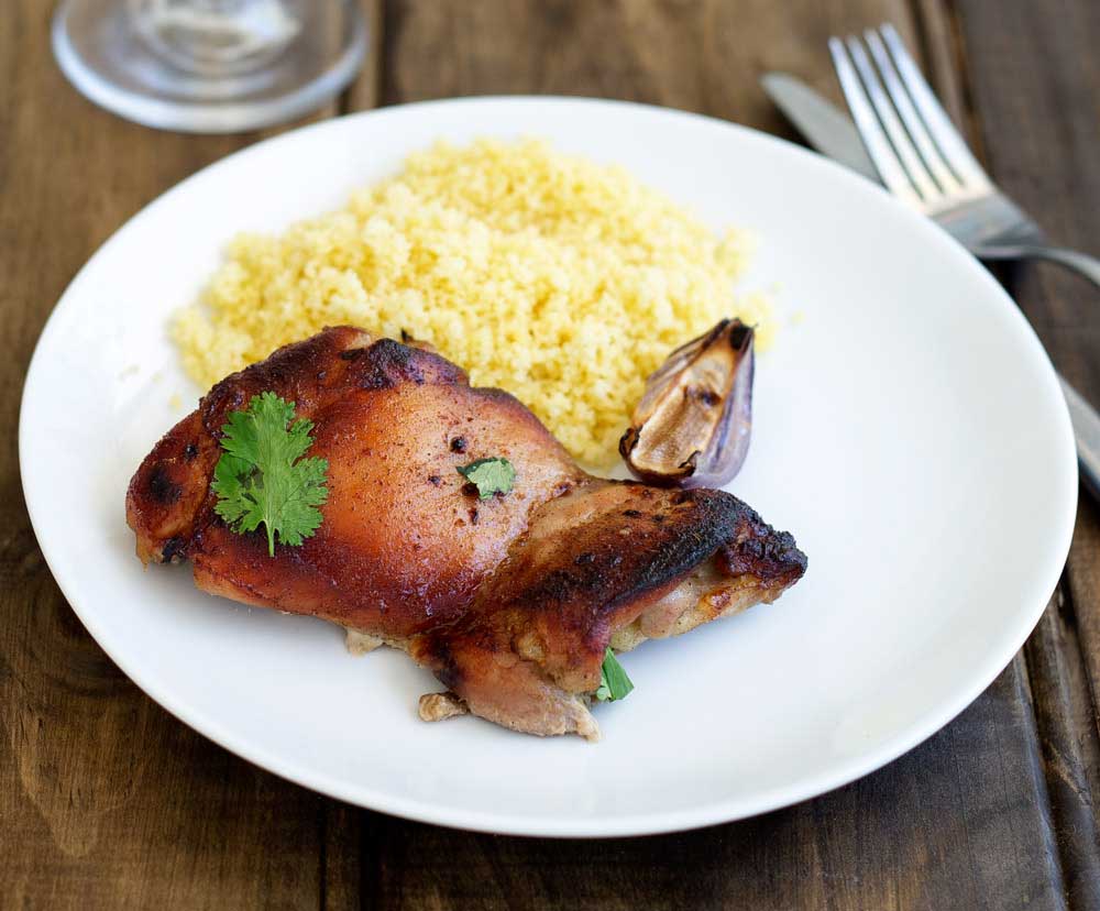 Baked Cardamon Honey Chicken with Buttered Couscous. A warming, soothing and comforting dinner that is easy to prepare and cooks in the oven.