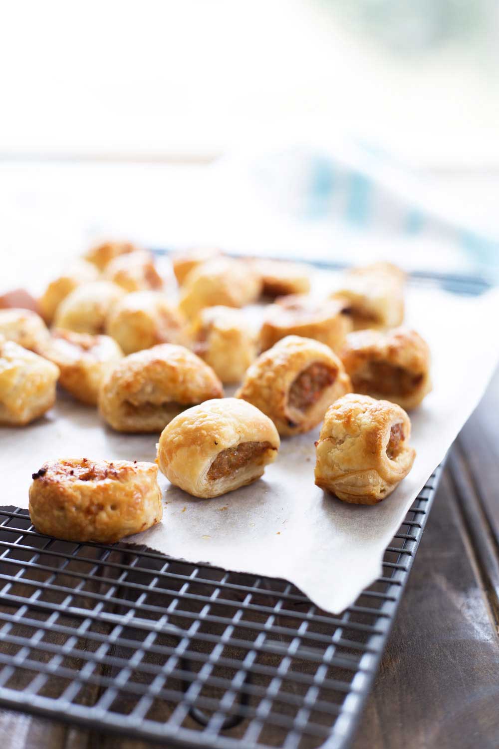 These sausage rolls use chicken rather than the more traditional pork mince. They also contain 4 vegetables and hidden lentils, all wrapped up inside flaking puff pastry. So simple to make, you will wonder why you ever bought them! | Sprinkles and Sprouts