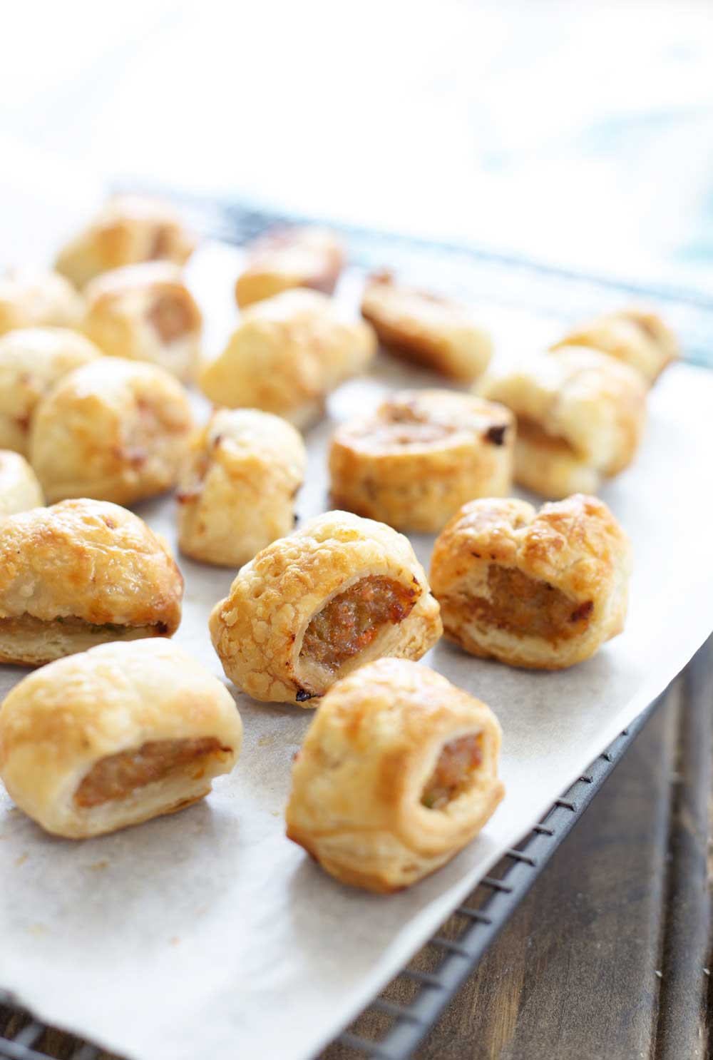 These sausage rolls use chicken rather than the more traditional pork mince. They also contain 4 vegetables and hidden lentils, all wrapped up inside flaking puff pastry. So simple to make, you will wonder why you ever bought them! | Sprinkles and Sprouts