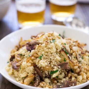 Warm lamb, sweet sticky onions, crunchy buttery pine nuts and fresh parsley all stirred through soft fluffy couscous. This meal is comforting but in no way boring! Eaten by the spoonful with a cold beer it is the perfect easy to eat dinner. Sit down on the sofa, find something good to watch and spoon it into your mouth. Yum! | Sprinkles and Sprouts