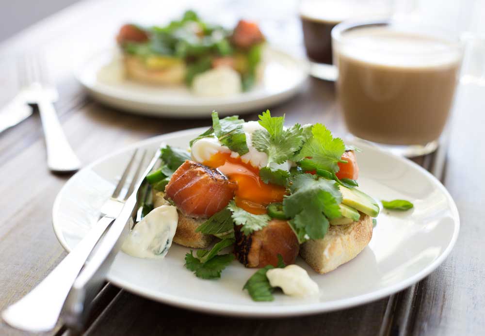 Coral salty, sweet salmon, a soft oozing poached egg, lime spiked avocado and the kick of chilli cooled with sour cream. All on top of a toasted english muffin. This muffin breakfast is miles away from the McMuffin. With a short cooking time this recipe is perfect for brunch.