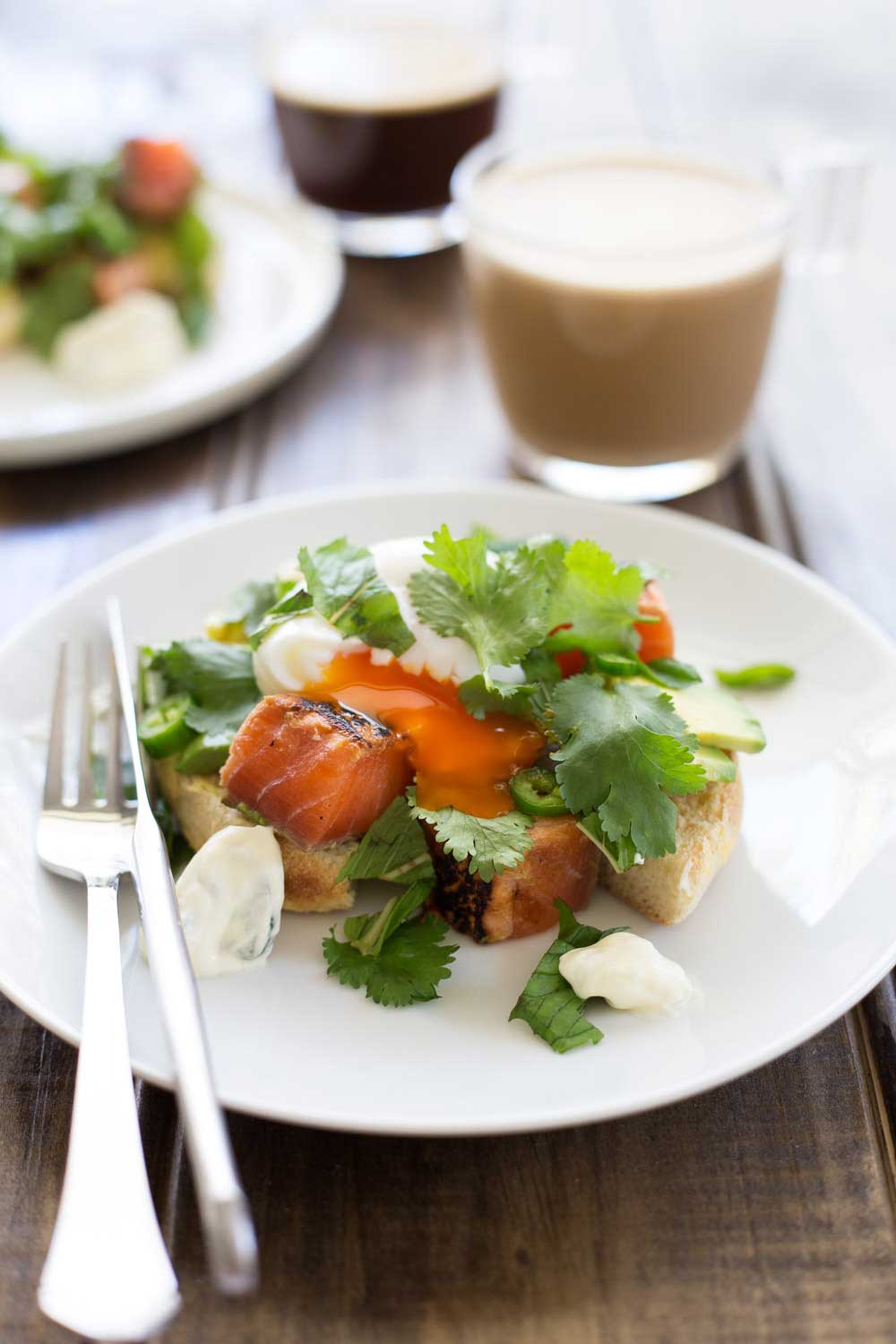 Coral salty, sweet salmon, a soft oozing poached egg, lime spiked avocado and the kick of chilli cooled with sour cream. All on top of a toasted english muffin. This muffin breakfast is miles away from the McMuffin. With a short cooking time this recipe is perfect for brunch.
