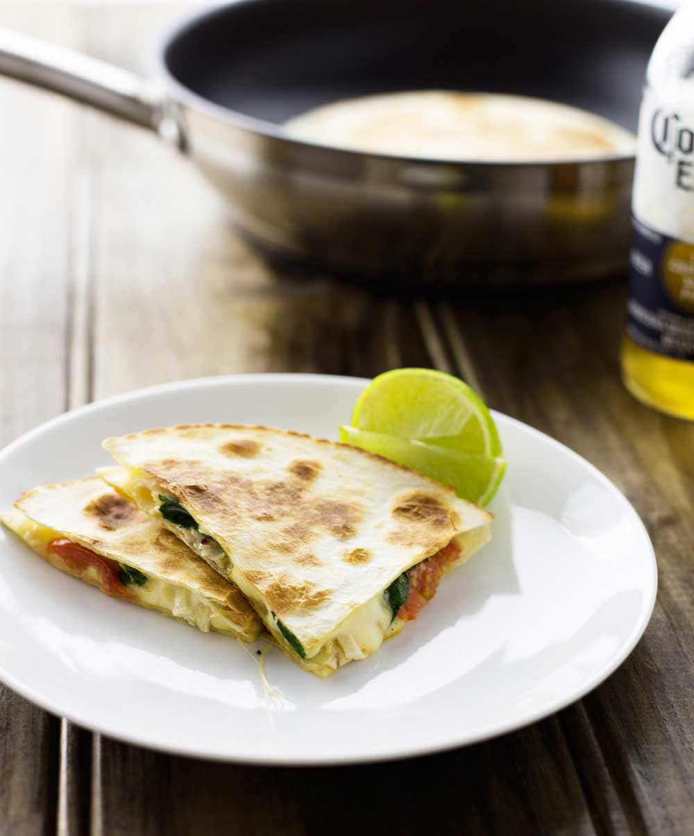 Cajun Chicken Quesadillas. Cheesy spicy chicken filled tortillas grilled until crisp and melted. A delicious snack or light meal.