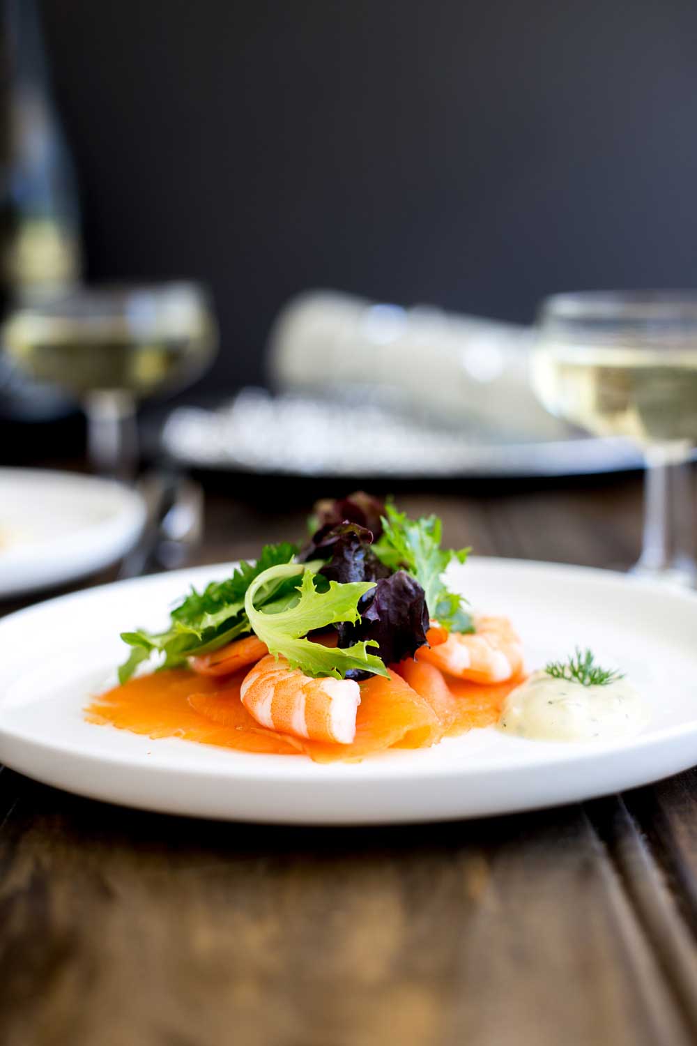 This Salmon and Prawn Salad with a Gravlax dressing is perfect for Christmas. It is rich yet light, feels posh and is super simple to make. As part of a Christmas feast it is the perfect first course. | Sprinkles and Sprouts