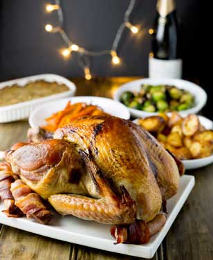 This slow roasted turkey is juicy and so simple. Without any basting, brining or intricate butter rubbing bacon weaving, you get a moist delicious bird.