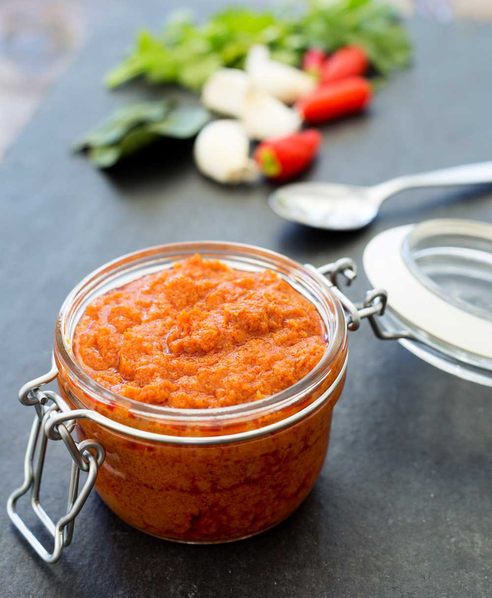 Thai Red Curry Paste, a fragrant and delicious paste that makes whipping up a midweek curry a breeze. This recipe is simple to make and with my super amazing storage tip you will always have a supply of homemade fresh curry paste. 