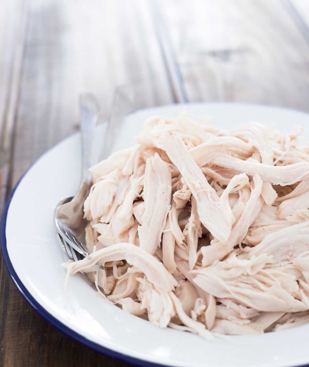 What if I told you you could have a succulent, juicy whole chicken cooked in 30 minutes!!! Yes, that is right a whole chicken in 30 minutes! Perfect for shredded chicken meat for tacos/sandwiches/wraps/salads. And all super quick and super juicy! No dry chicken here with this succulent pressure cooker chicken!