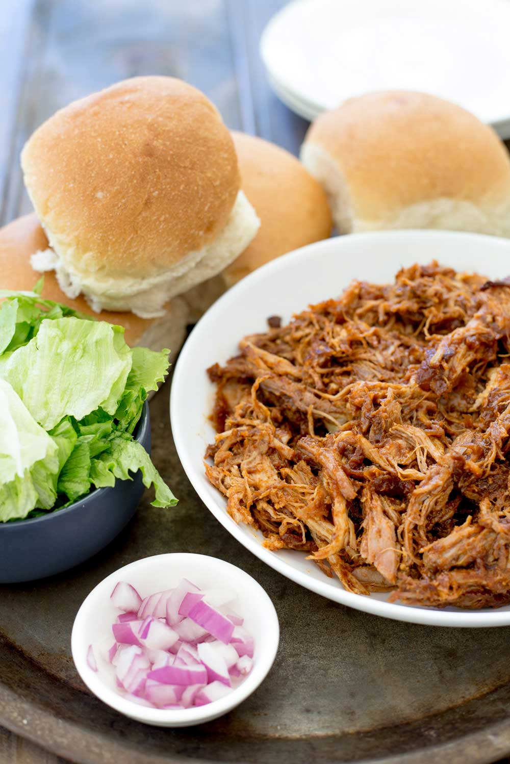 Who doesn't love pulled pork!!!! Shredded delicious meat that you can use in so many different ways!!!!! This BBQ pulled pork recipe is awesome as it cooks happily in the slow cooker, and makes the most delicious sauce. Effortless scrumptious dinner!!! Hand-up who is up for that one!