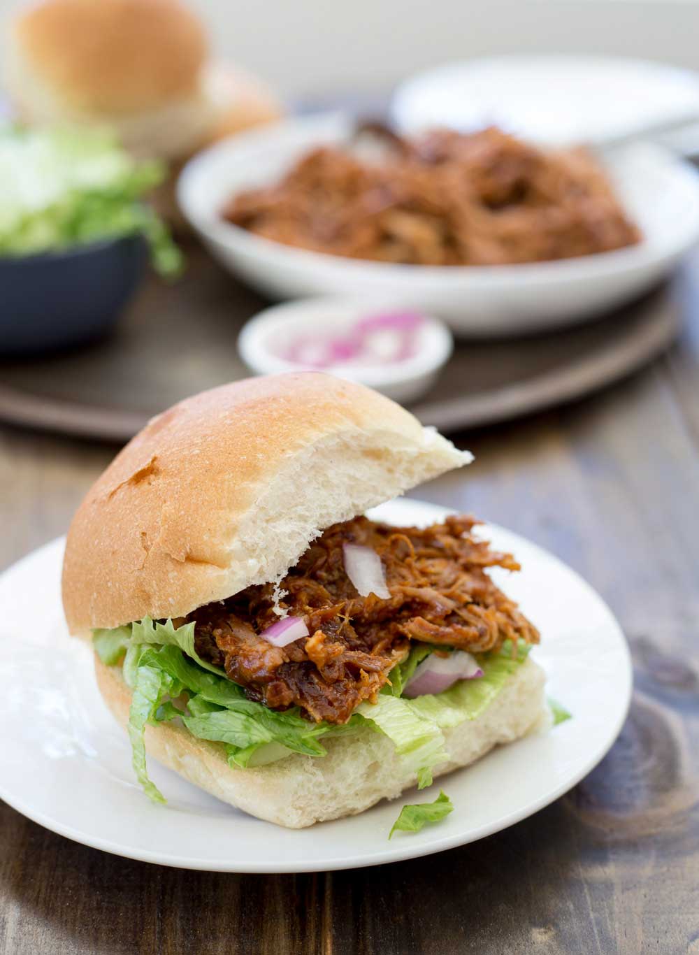 Who doesn't love pulled pork!!!! Shredded delicious meat that you can use in so many different ways!!!!! This BBQ pulled pork recipe is awesome as it cooks happily in the slow cooker, and makes the most delicious sauce. Effortless scrumptious dinner!!! Hand-up who is up for that one!
