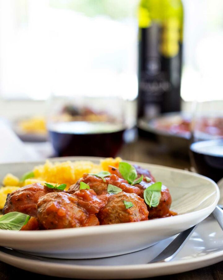 Baked Italian Meatballs with Marinara Sauce and Cheesy Polenta
