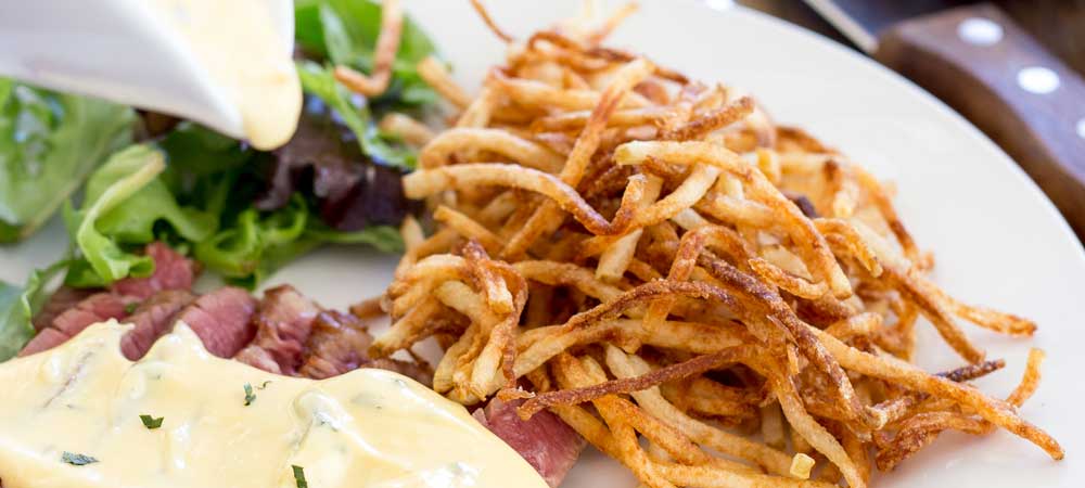Crispy thin fries that are perfect for a snack or with a meal. Shoestring fries or as you often see these on menus as matchstick fries are darn delicious!