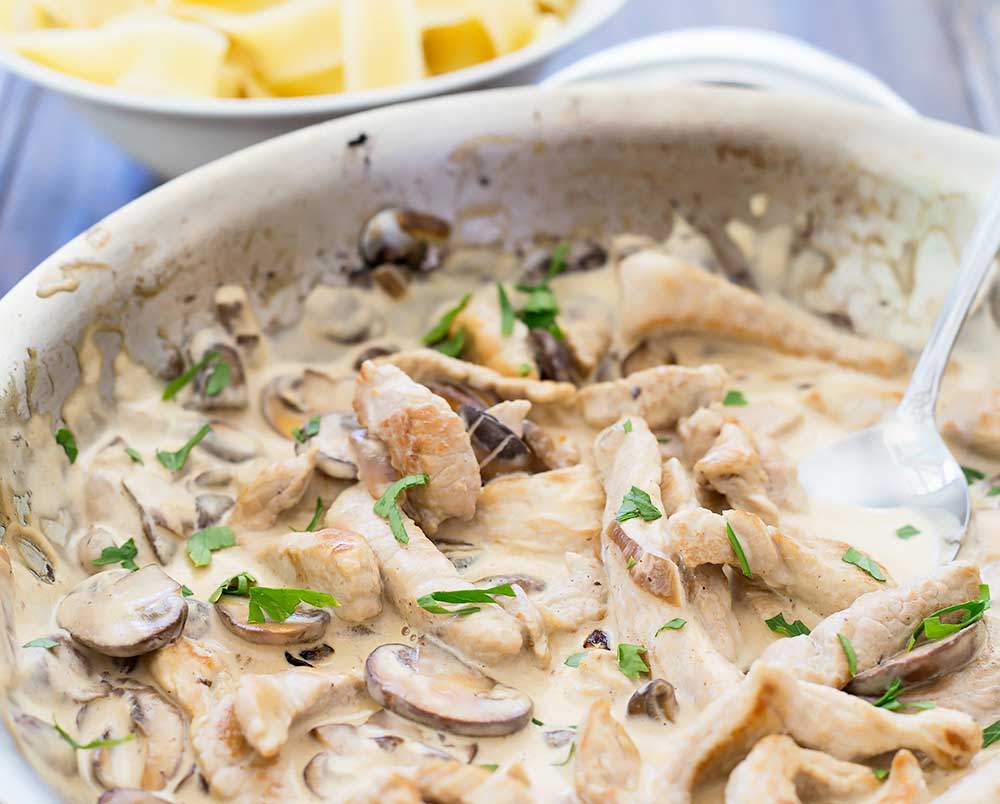 This pork stroganoff is the best kind of comfort food! Tender pork, cooked with mushrooms and onions in a creamy sauce. It's delicious, filling and completely made with fresh ingredients! (No cans of soup here!!!) | Sprinkles and Sprouts