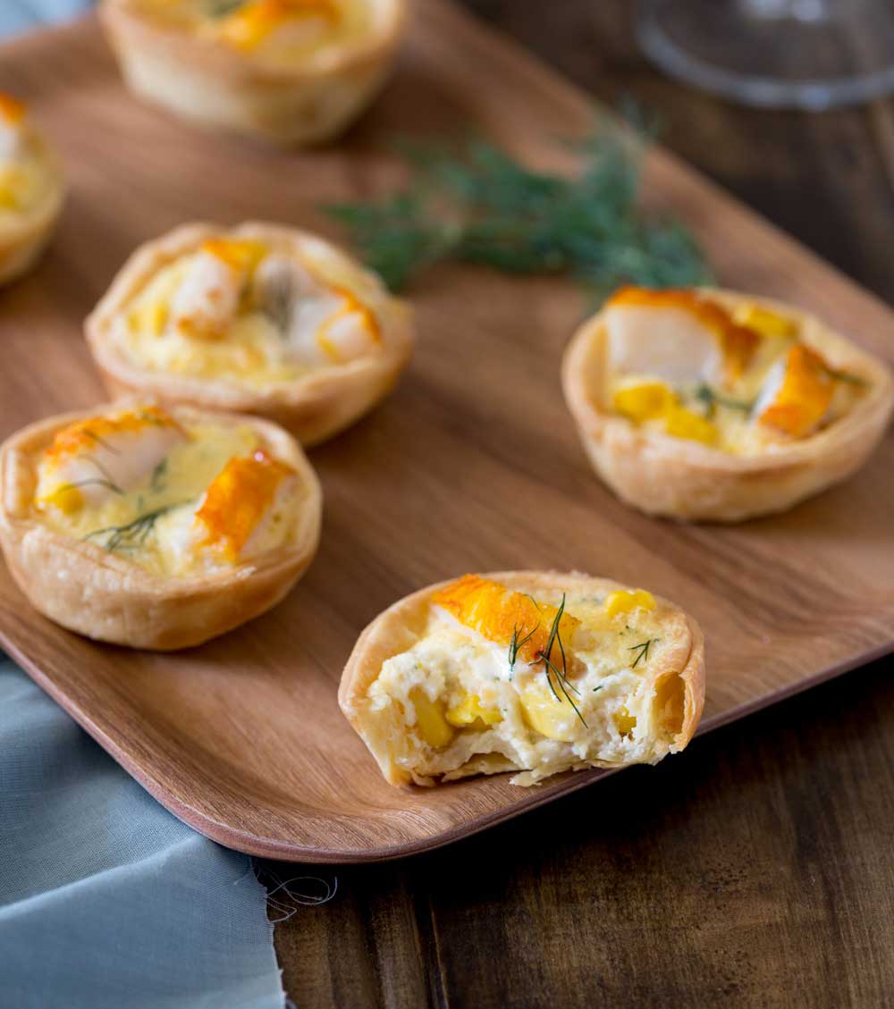 Smoked fish and sweetcorn combined with a a rich egg mixture and incased in a perfectly crisp tartlet case. These Smoked Fish and Sweetcorn Tartlets are so good, I bet you can't stop at one!