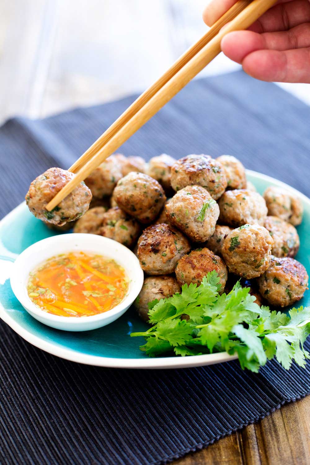 These Thai Pork Meatballs are flavour bombs! Fabulous thai flavours in easy to eat form! Serve these as a canapé, nibble or appetiser. Or cook them up as part of a Thai banquet. However you make them, make sure you grab a few for yourself as these go quickly.