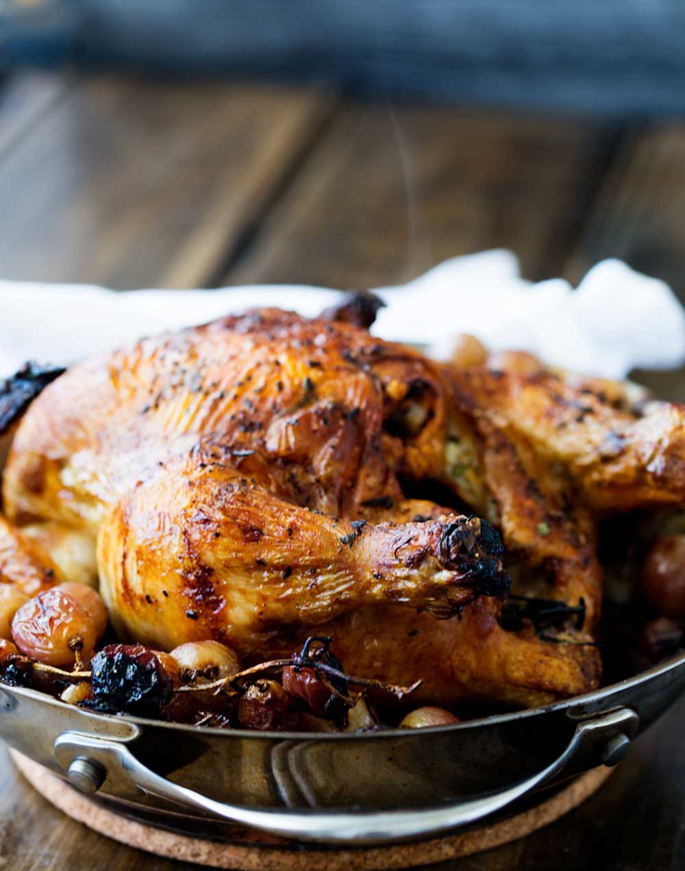 Succulent roast chicken, soft sweet onions, jammy grapes and a rich buttery rosemary sauce. Perfect with a salad and some crispy bread. 