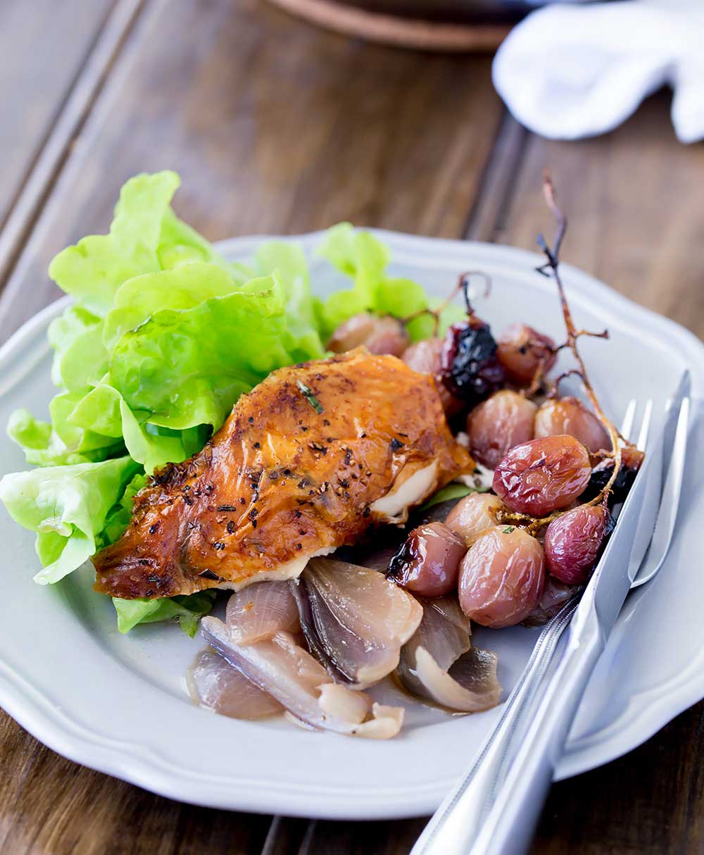 Succulent roast chicken, soft sweet onions, jammy grapes and a rich buttery rosemary sauce. Perfect with a salad and some crispy bread. 