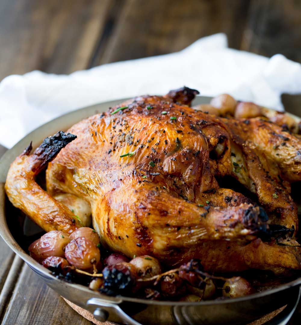 Succulent roast chicken, soft sweet onions, jammy grapes and a rich buttery rosemary sauce. Perfect with a salad and some crispy bread. 