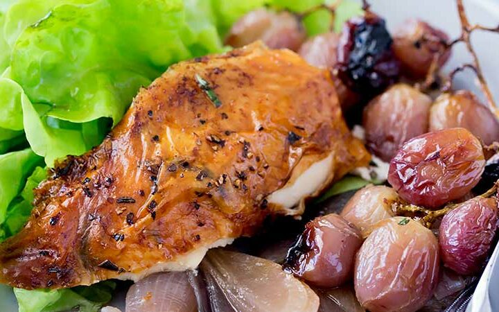 Succulent roast chicken, soft sweet onions, jammy grapes and a rich buttery rosemary sauce. Perfect with a salad and some crispy bread.