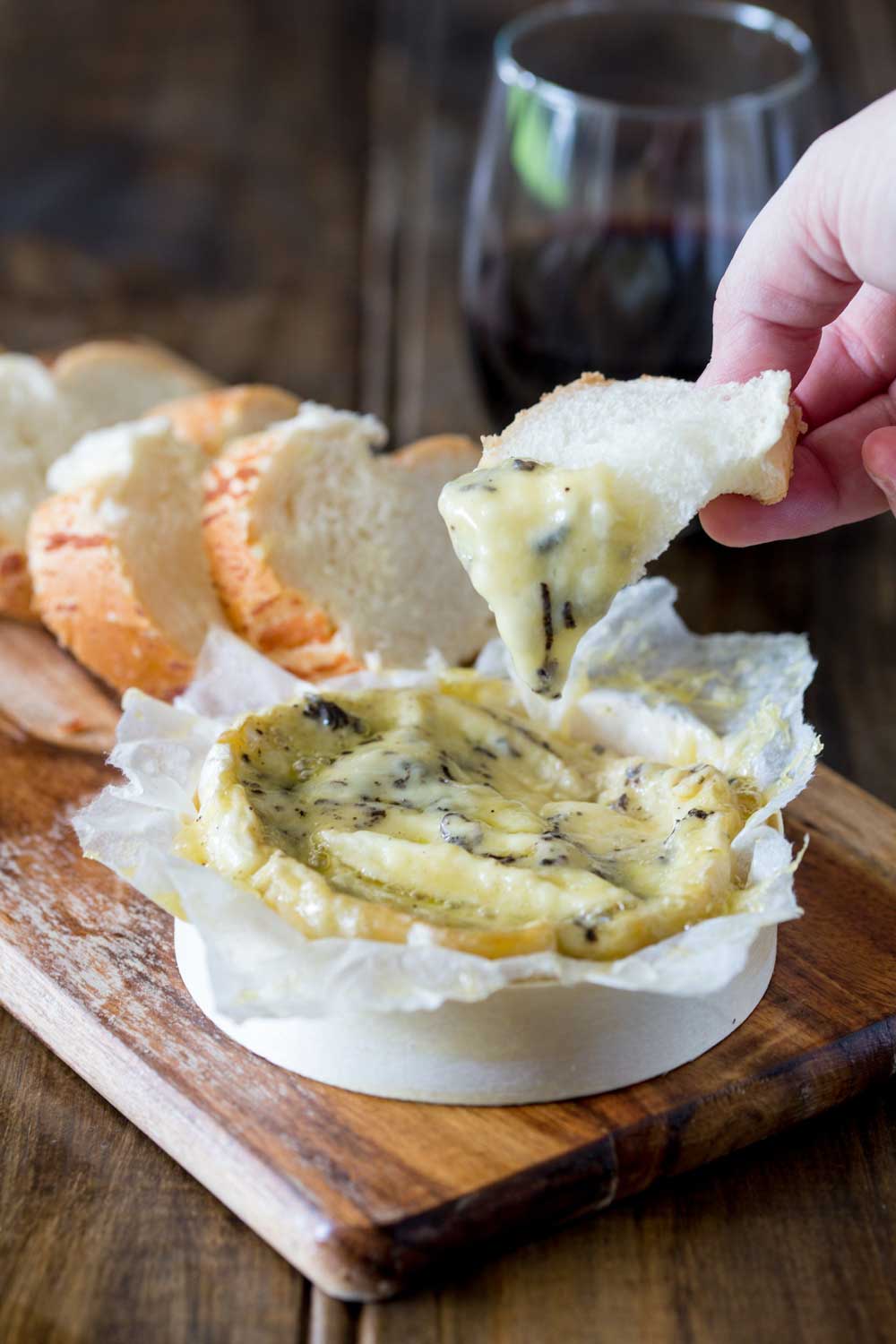 Creamy brie, enhanced with the earthy delicious flavours of black truffle all baked to oozing delicious perfection! Seriously this Baked Black Truffle Stuffed Brie is decadence and heaven on a plate!