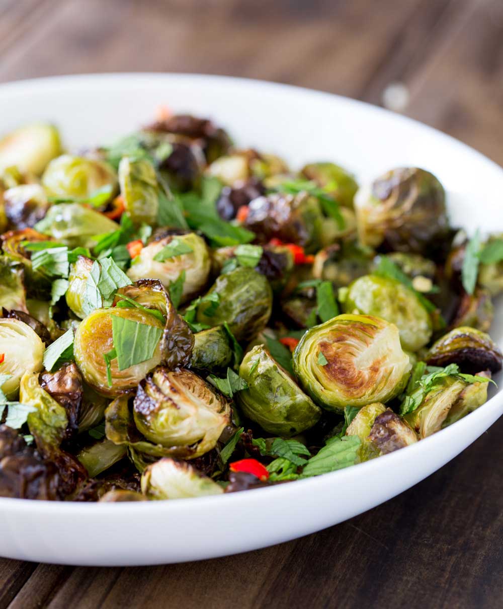 These roasted brussels sprouts are a revelation!!! Deliciously charred, with a fabulously sweet, sour, spicy and salty dressing. I can guarantee that these will be demolished!!!