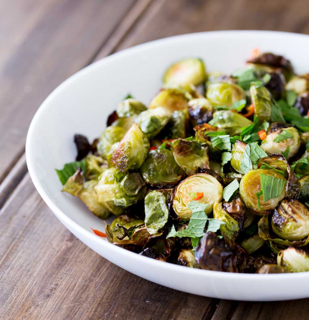 These roasted brussels sprouts are a revelation!!! Deliciously charred, with a fabulously sweet, sour, spicy and salty dressing. I can guarantee that these will be demolished!!!