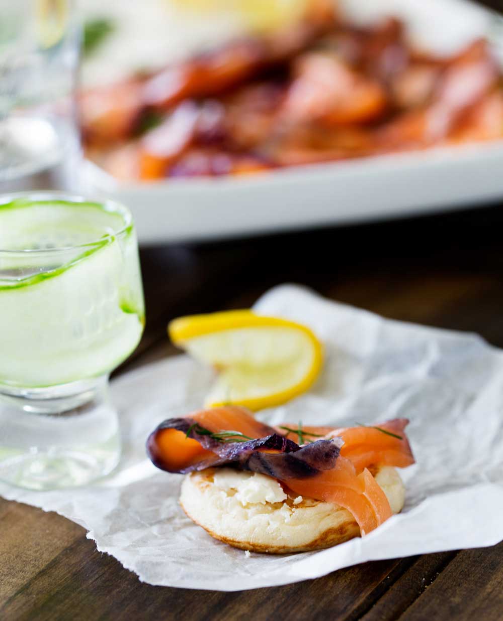 Home cured salmon. A delicious twist on a traditional gravlax. Fruity blueberries, spicy notes of dill and a salty sweet edge. This cured salmon is beautiful and delicious.