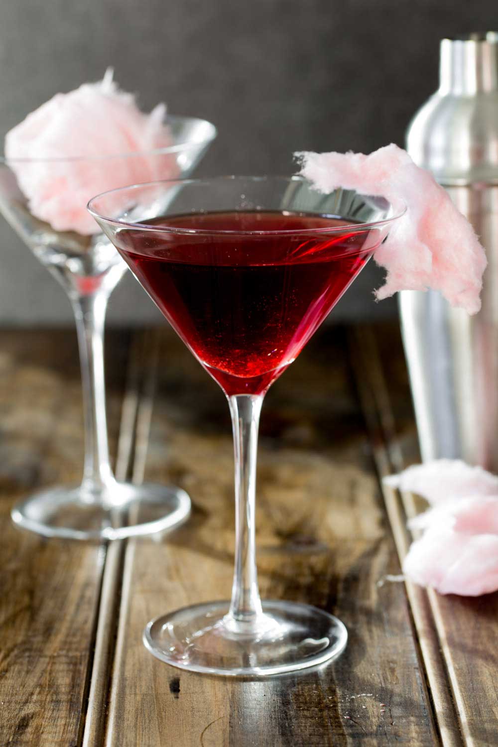 Fairy Floss Martini. A delicious cocktail that adds a bit of theatre to your night! This has a mixture of tart fruit and sweet sugar. Making it a delicious twist on your normal cocktail, plus it is fun. A bit of bar theatre without the need to throw bottles in the air!!!
