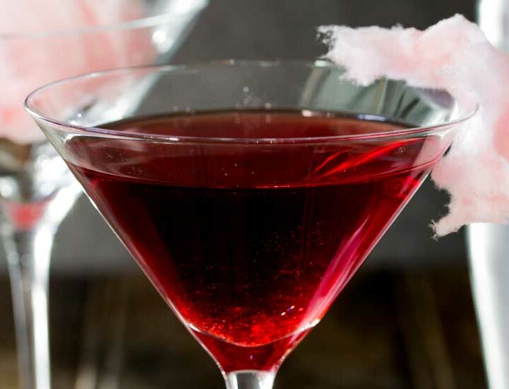 Fairy Floss Martini. A delicious cocktail that adds a bit of theatre to your night! This has a mixture of tart fruit and sweet sugar. Making it a delicious twist on your normal cocktail, plus it is fun. A bit of bar theatre without the need to throw bottles in the air!!!