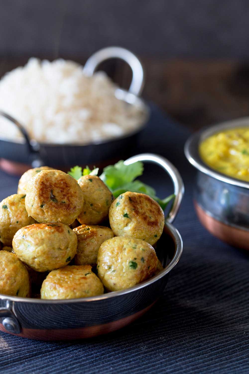These Indian Spiced Chicken Meatballs are sure to be a hit with the whole family!!! Tender, succulent and packed with wonderful spices. This is the deliciousness of curry in easy to eat meatball form.