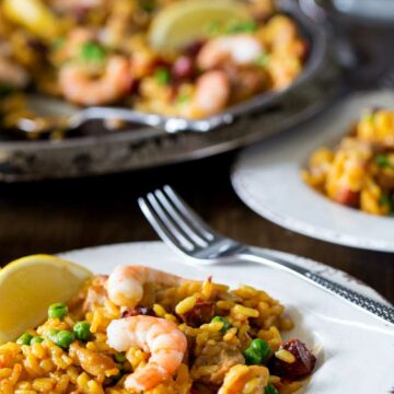 Paella is the ultimate one pan dish. Rice, meat and fish are cooked together in a flavourful stock in this easy and delicious Spanish classic.