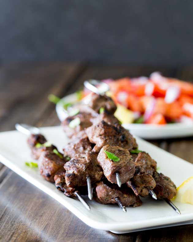 Tender juicy steak, marinated in herbs and spices and then grilled to a crusty perfection. These Brazilian Beef Kebabs are a great mid-week meal. The beef is packed with flavour and with a couple of super simple sides you have a great meal with really very little effort!