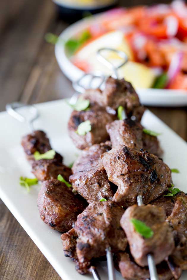 Tender juicy steak, marinated in herbs and spices and then grilled to a crusty perfection. These Brazilian Beef Kebabs are a great mid-week meal. The beef is packed with flavour and with a couple of super simple sides you have a great meal with really very little effort!