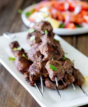 Tender juicy steak, marinated in herbs and spices and then grilled to a crusty perfection. These Brazilian Beef Kebabs are a great mid-week meal. The beef is packed with flavour and with a couple of super simple sides you have a great meal with really very little effort!