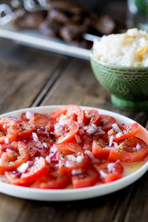 A super simple tomato salad with a punch of flavour. Perfect as a side dish with some Brazilian Barbecue | Sprinkles and Sprouts