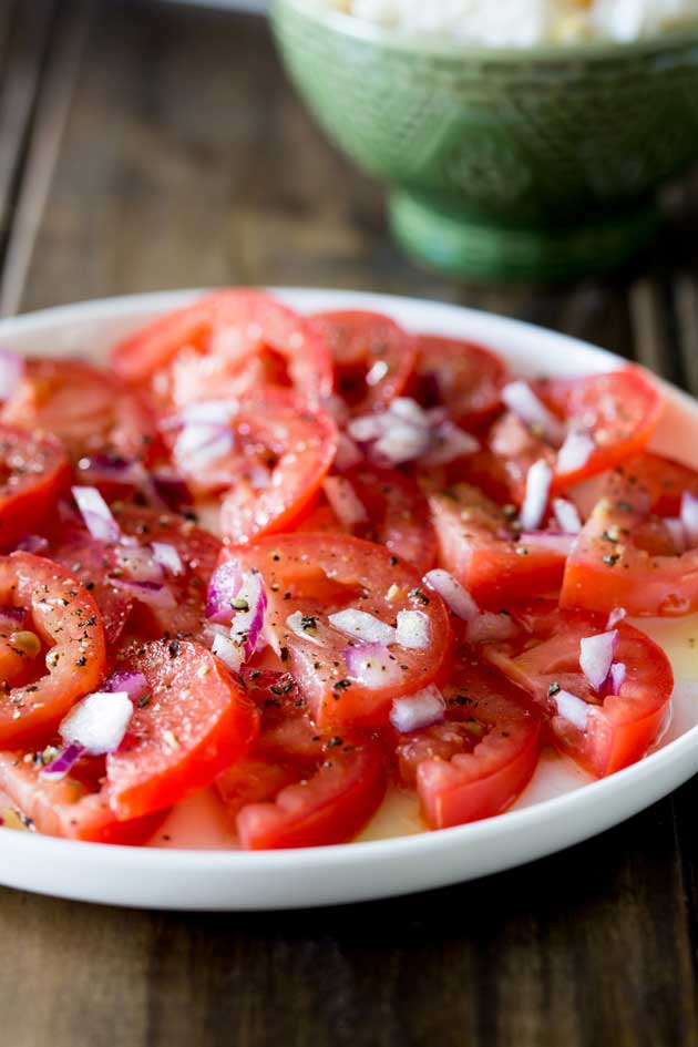 A super simple tomato salad with a punch of flavour. Perfect as a side dish with some Brazilian Barbecue | Sprinkles and Sprouts