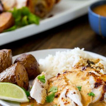Sweet, juicy chicken with the wonderful flavour of Thai massaman curry, served with some delicious roasted potatoes, plain rice and a rich Thai gravy. This is roast dinner with a booster pack on! | Sprinkles and Sprouts