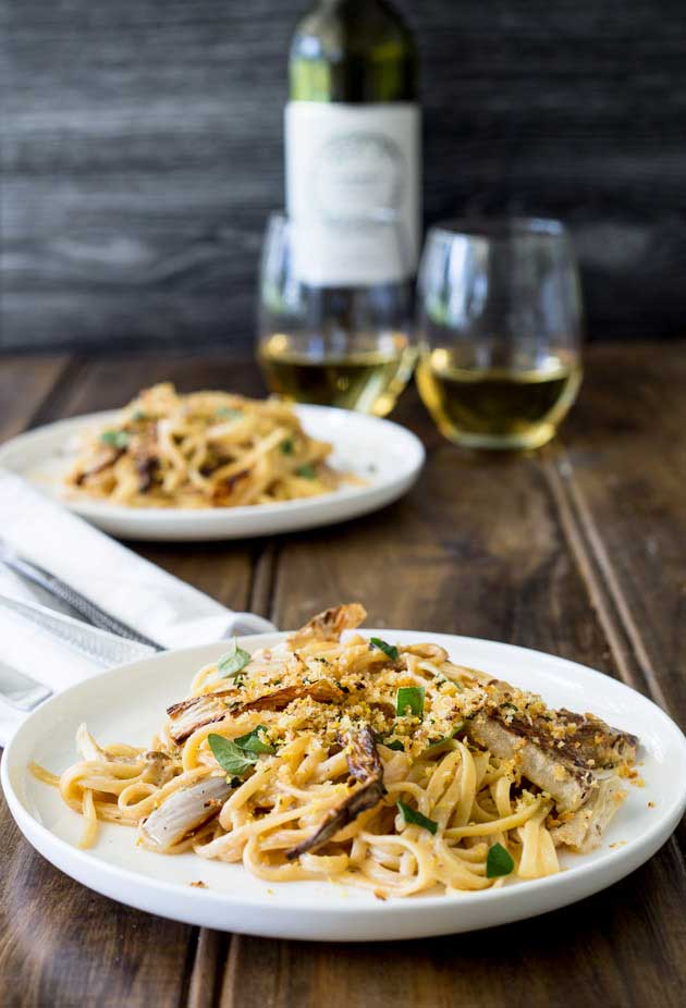 Sweet roasted fennel, paired with a subtle bite of lemon and a salty pangrattao. All served with a rich creamy linguine. This is the perfect mid-week meal, but it is beautiful enough for company, especially as it is vegetarian! And packed with so much flavour! | Get the recipe at Sprinkles and Sprouts