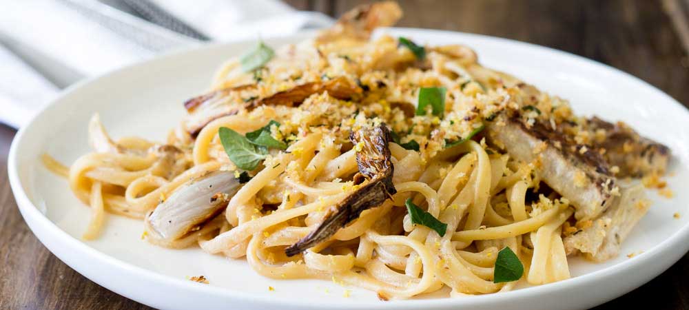 Sweet roasted fennel, paired with a subtle bite of lemon and a salty pangrattao. All served with a rich creamy linguine. This is the perfect mid-week meal, but it is beautiful enough for company, especially as it is vegetarian! And packed with so much flavour! | Get the recipe at Sprinkles and Sprouts