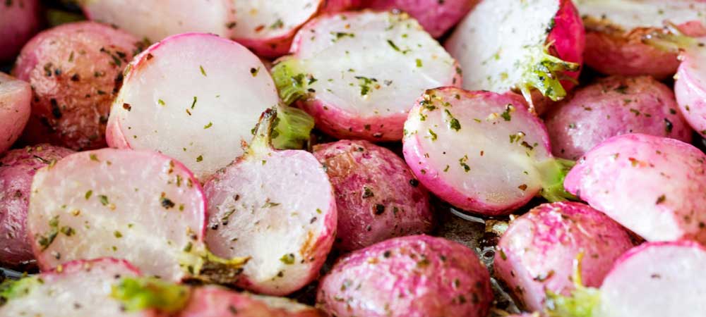 Roasted radishes are a wonderfully different roasted vegetable. They are perfect with fish or as a side dish with roast chicken. So different, so delicious and so simple!!! And look how beautiful they look!!!! | Sprinkles and Sprouts