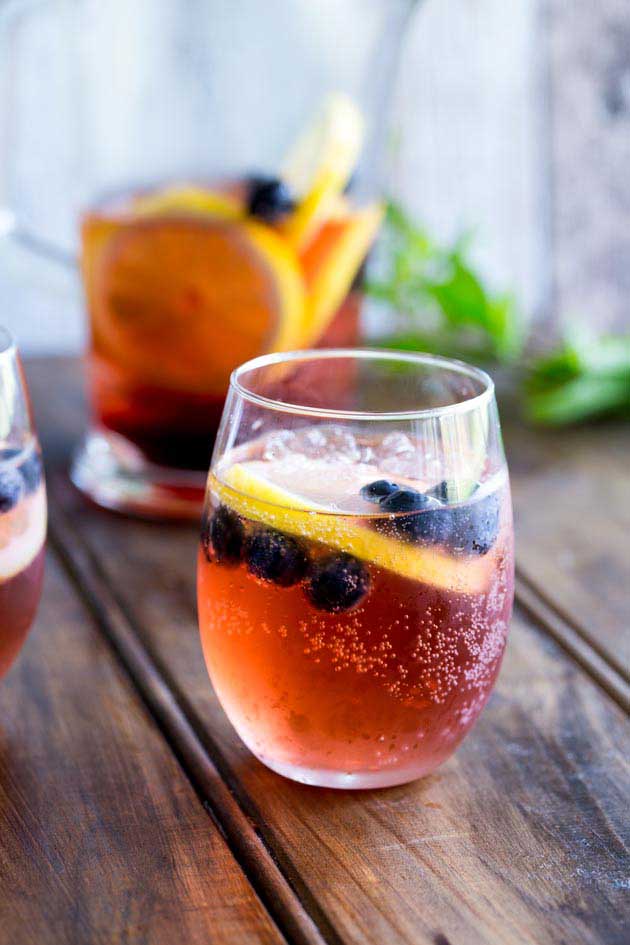 This Lemon and Blueberry Punch, is fruity and refreshing, but it delivers a great kick. Perfect for relaxing with friends, or for serving at a larger party!