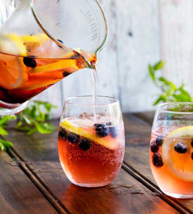 This Lemon and Blueberry Punch, is fruity and refreshing, but it delivers a great kick. Perfect for relaxing with friends, or for serving at a larger party!