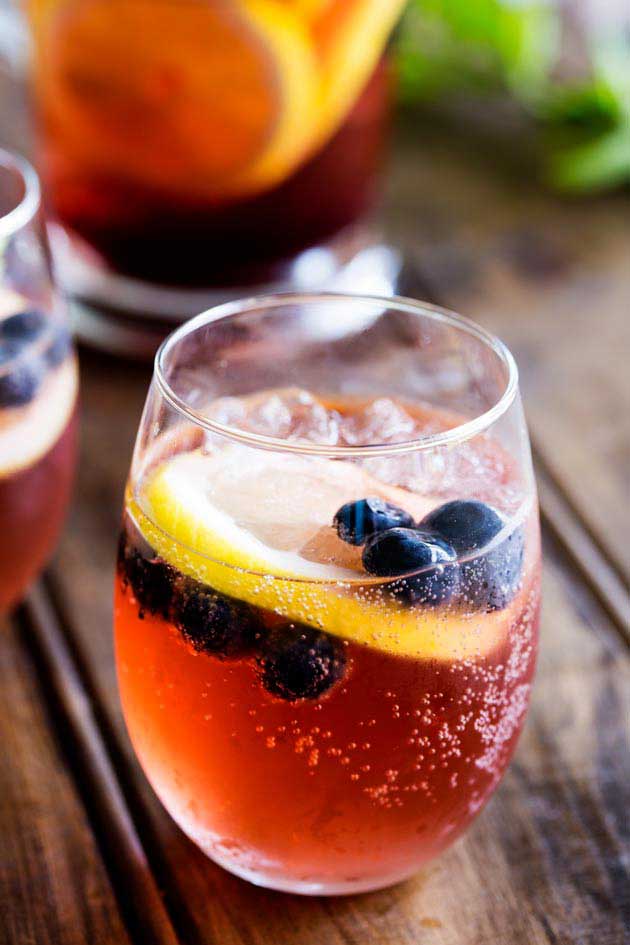 This Lemon and Blueberry Punch, is fruity and refreshing, but it delivers a great kick. Perfect for relaxing with friends, or for serving at a larger party!