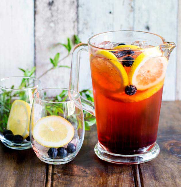 This Lemon and Blueberry Punch, is fruity and refreshing, but it delivers a great kick. Perfect for relaxing with friends, or for serving at a larger party!