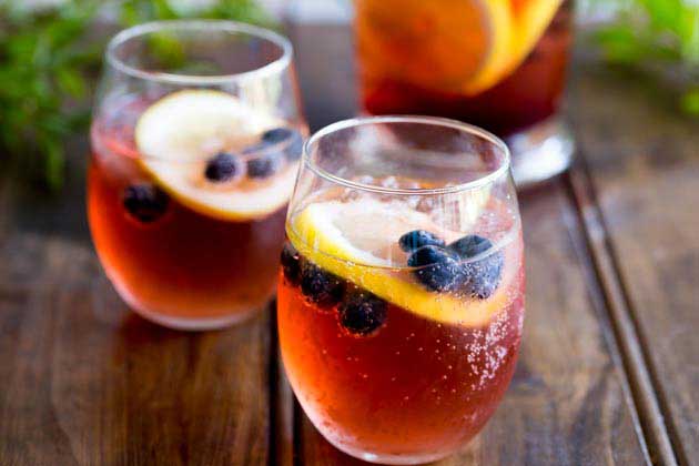 This Lemon and Blueberry Punch, is fruity and refreshing, but it delivers a great kick. Perfect for relaxing with friends, or for serving at a larger party!