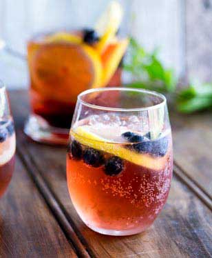 This Lemon and Blueberry Punch, is fruity and refreshing, but it delivers a great kick. Perfect for relaxing with friends, or for serving at a larger party!